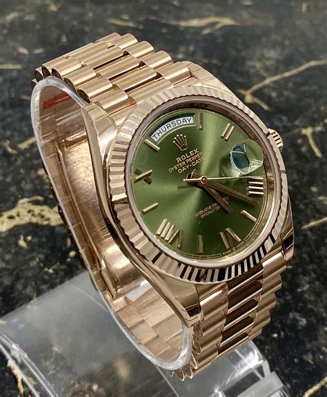 rolex green faced day date gold w diomands|Rolex Day-Date 40 228235.